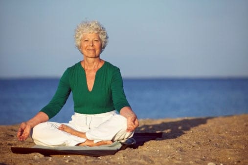 older woman meditating