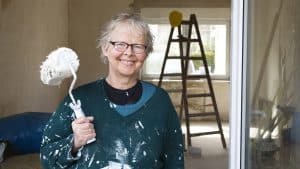 senior woman home maintenance